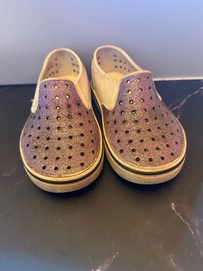 Native miles, purple glitter